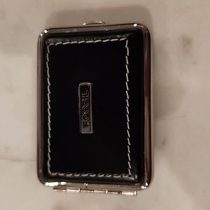 Leather pill box for handbag or pocket.